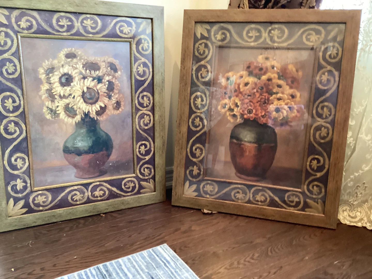 Two framed sunflower paintings