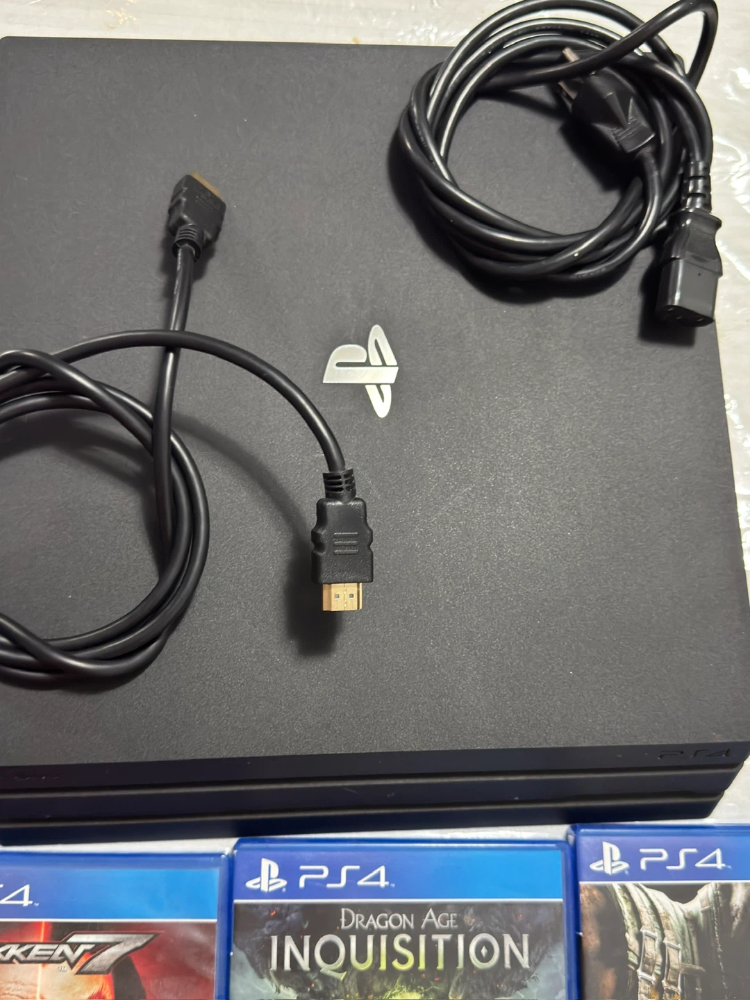 PlayStation 4 Pro with Games and Controllers - photo 2