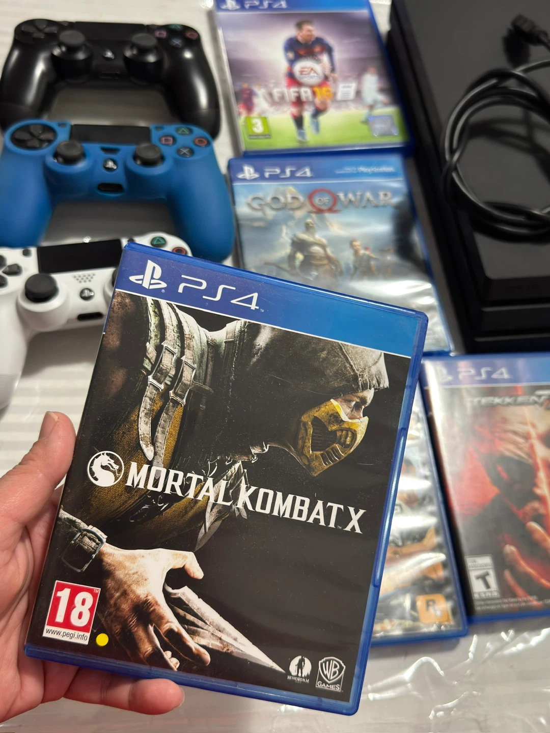 PlayStation 4 Pro with Games and Controllers - photo 5