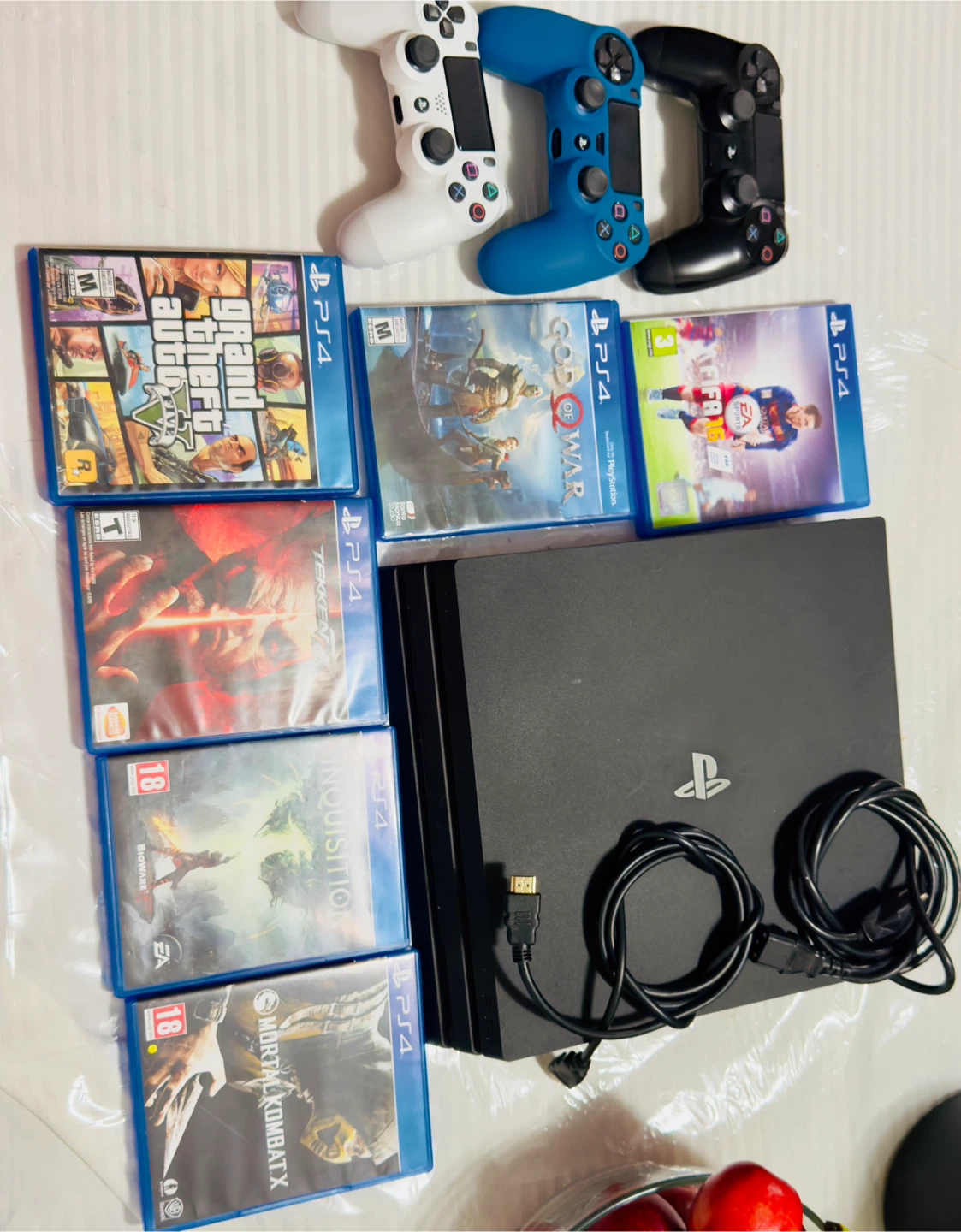 PlayStation 4 Pro with Games and Controllers
