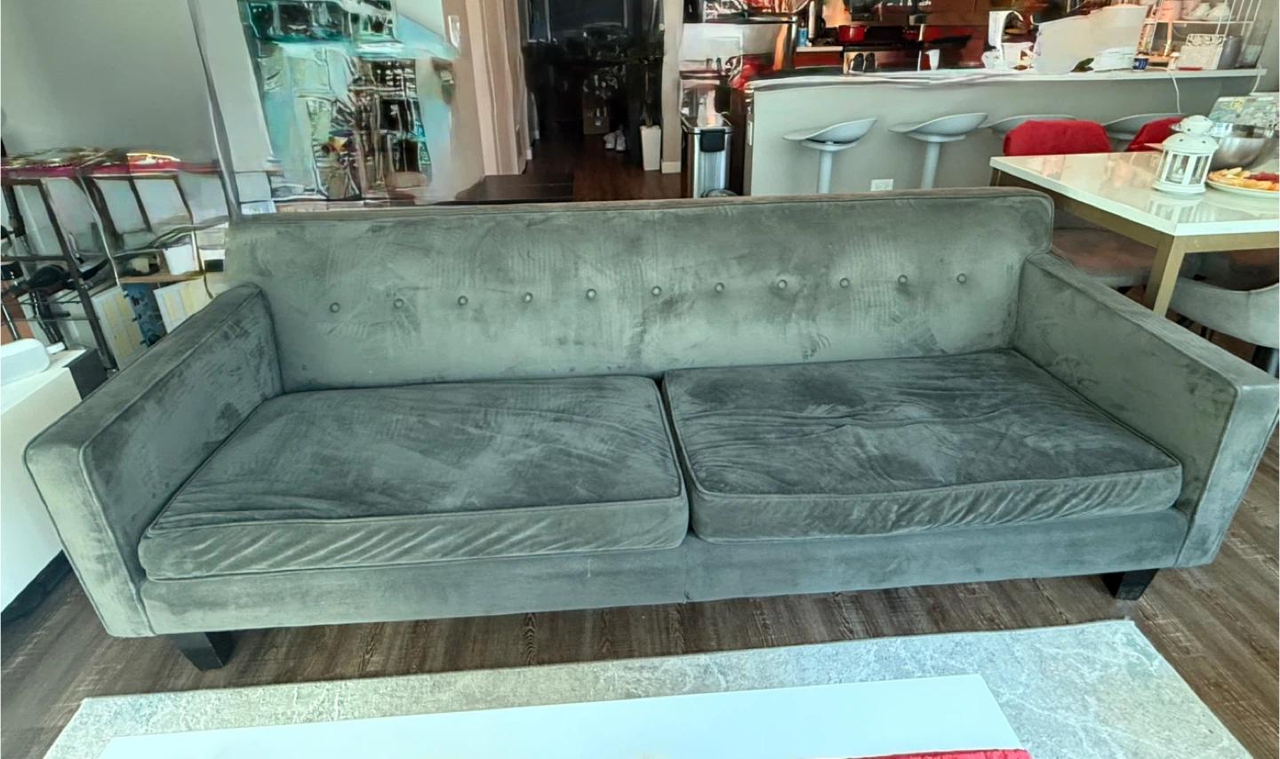 Beautiful modern gray velvet sofa in good condition.