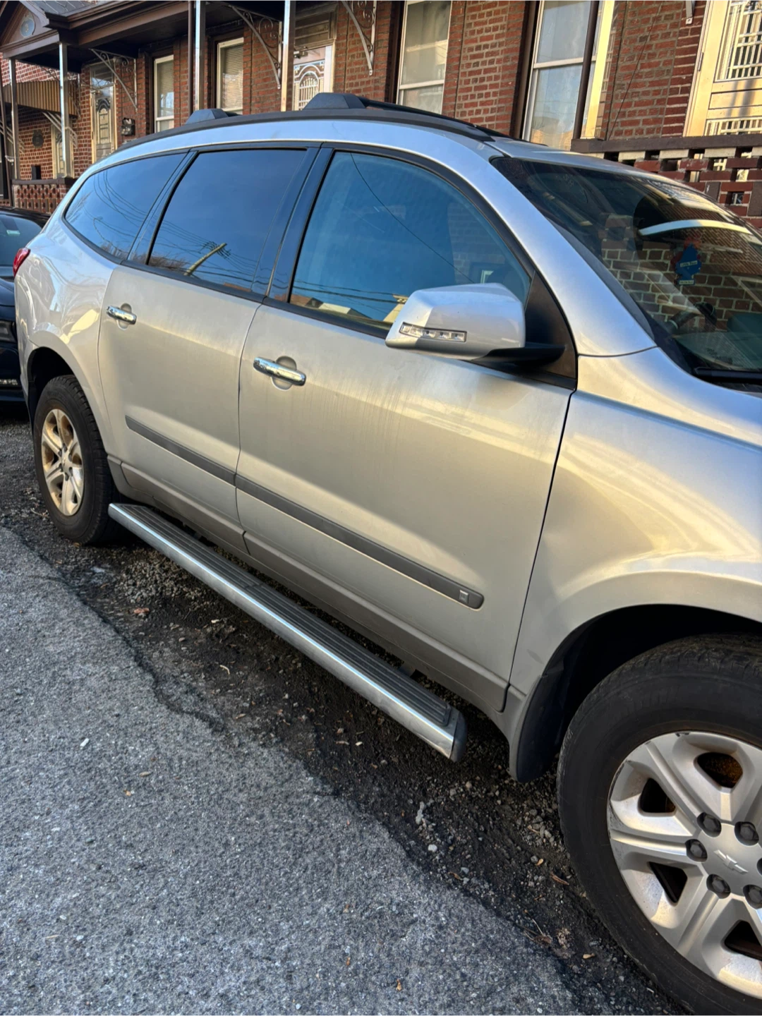 Silver Chevrolet Traverse SUV - photo 4