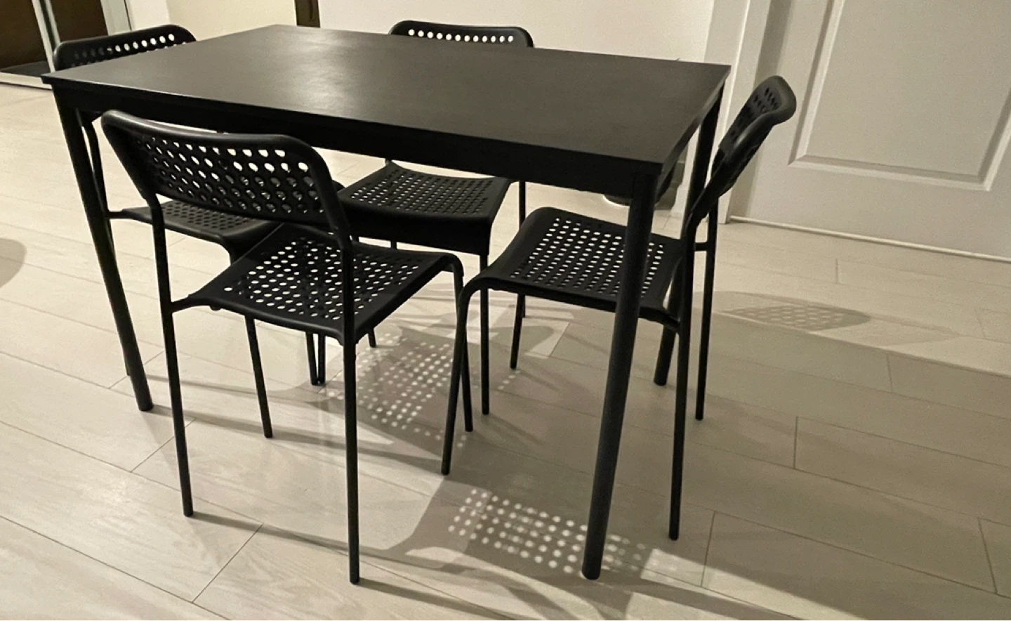 IKEA Black Dining Table with 4 Chairs - photo 3