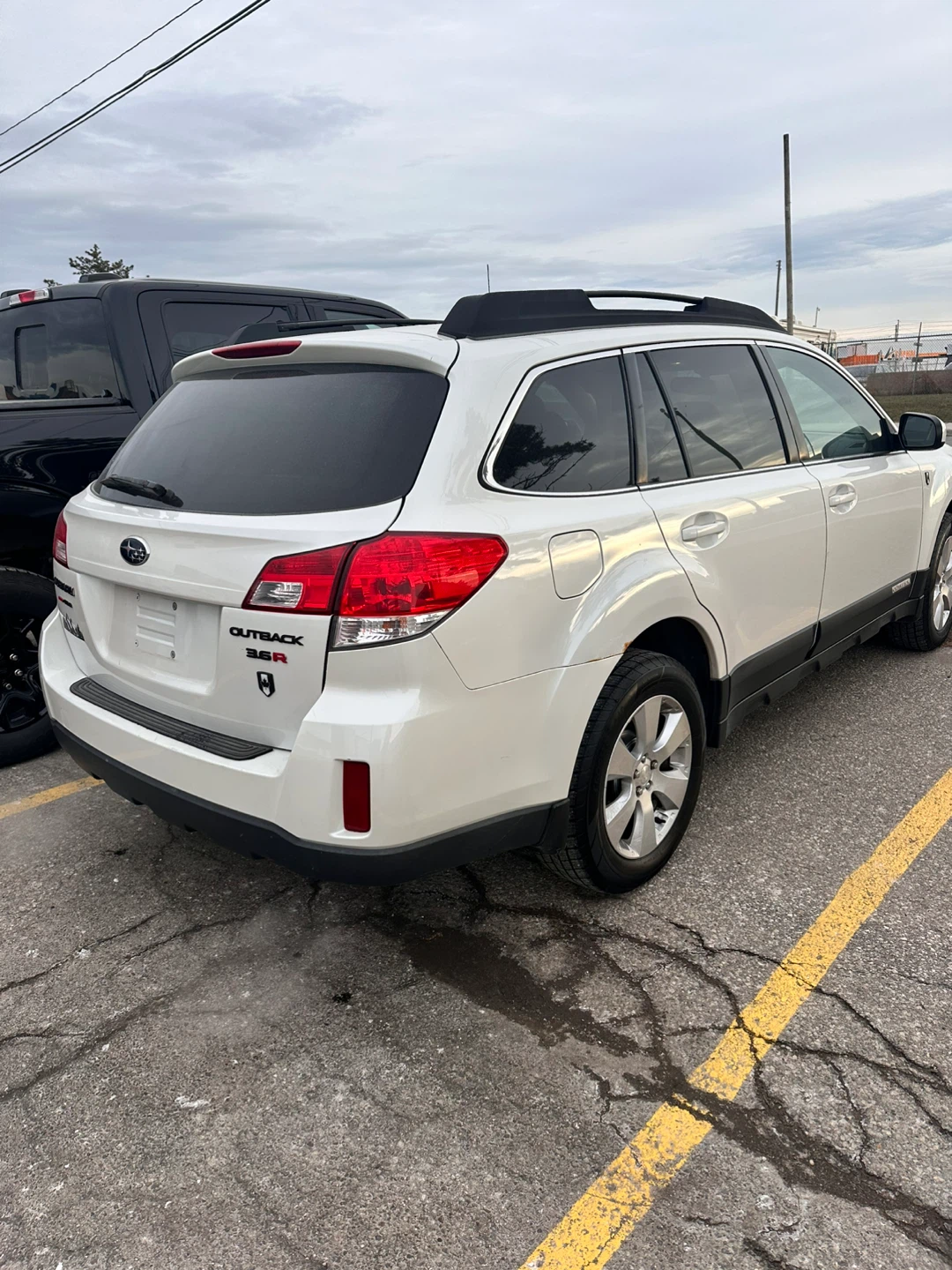 White Subaru Outback - photo 3