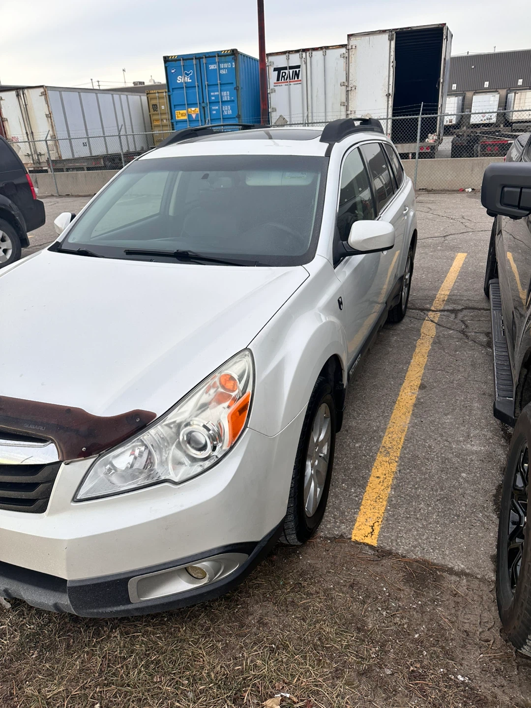 White Subaru Outback - photo 4