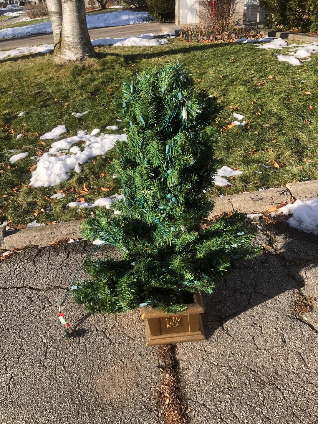 Artificial Christmas tree  56 inch tall.