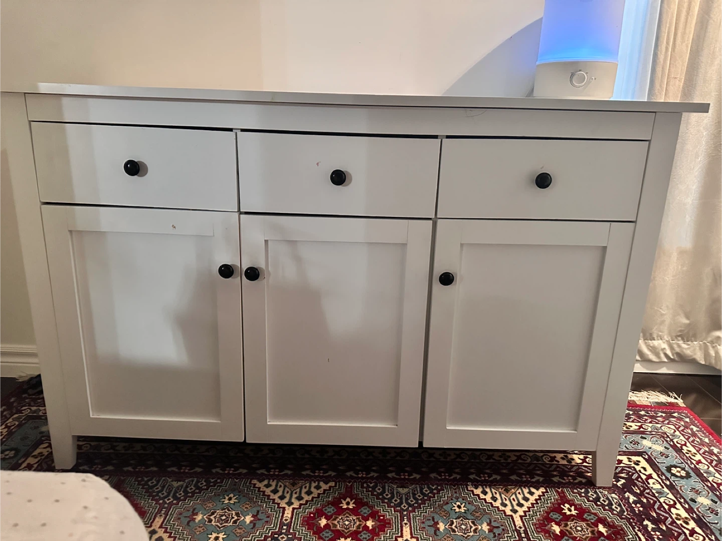 White sideboard with drawers and doors