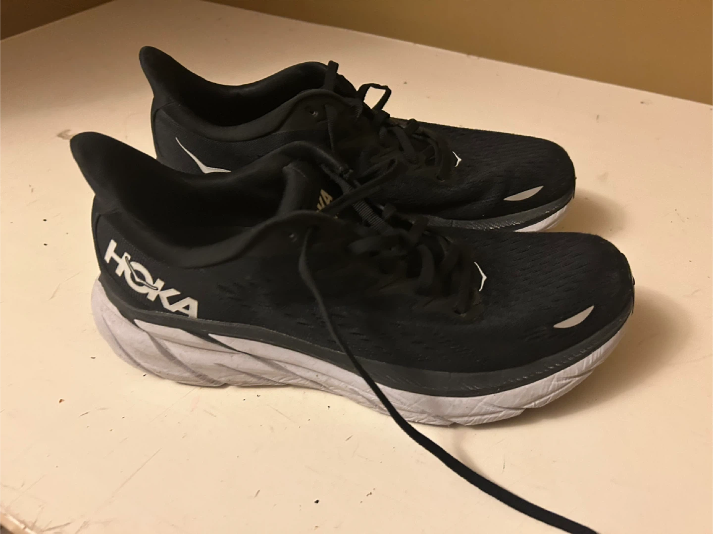 Hoka new never worn  Clifton 9.5 ladies Black Running Shoes