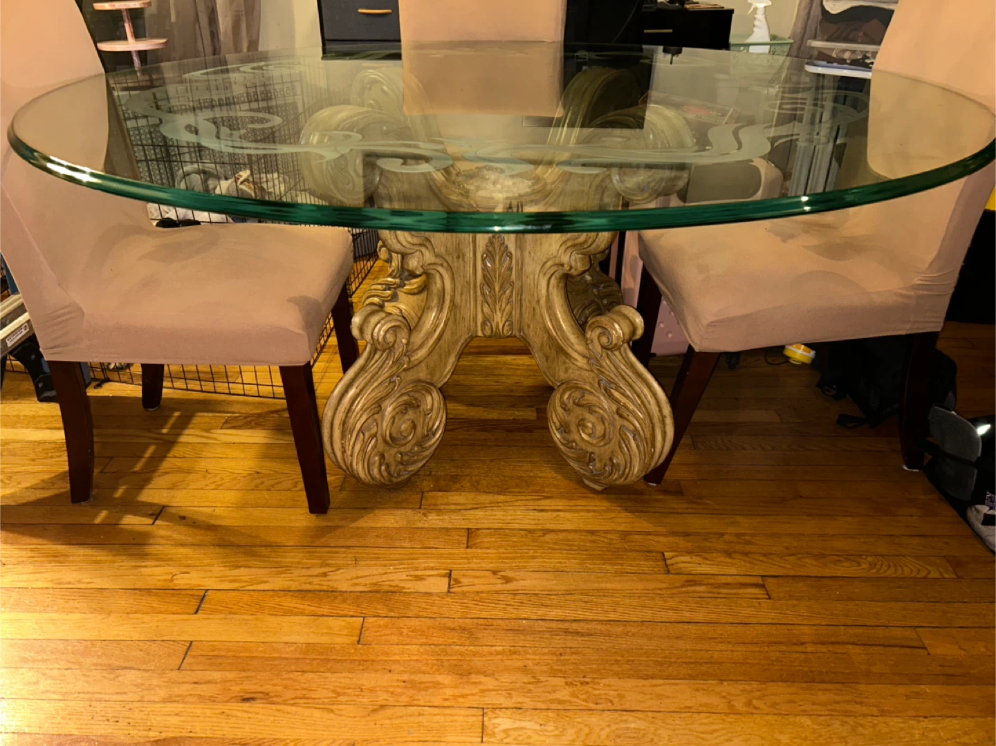 Round Glass Dining Table with Ornate Base