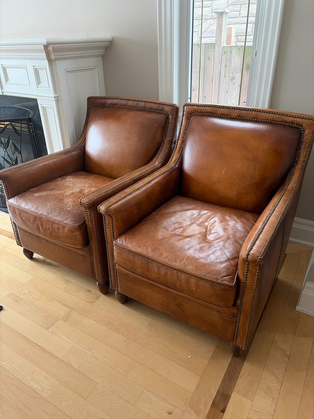 2 Genuine leather arm chairs