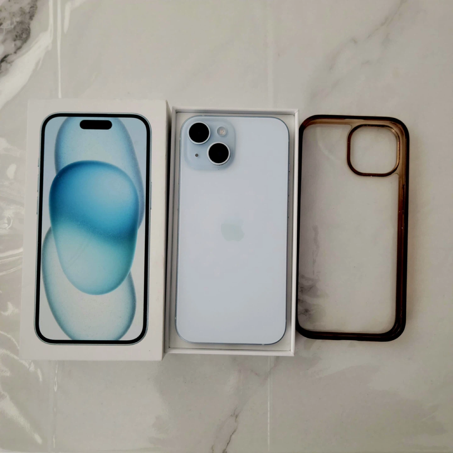 New iPhone 15- Blue, with Case - photo 2