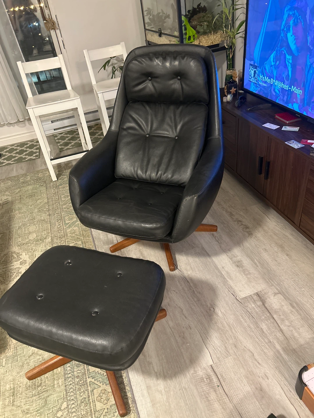 Black Leather Swivel and reclining Chair & Ottoman