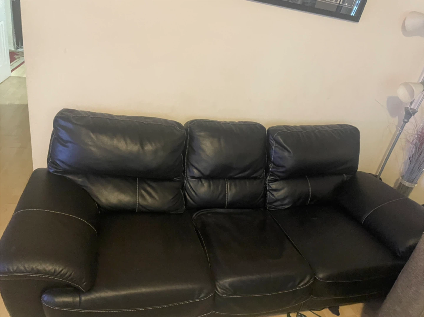 Black Leather Sofa with a silver leg.!! Moving sale!!