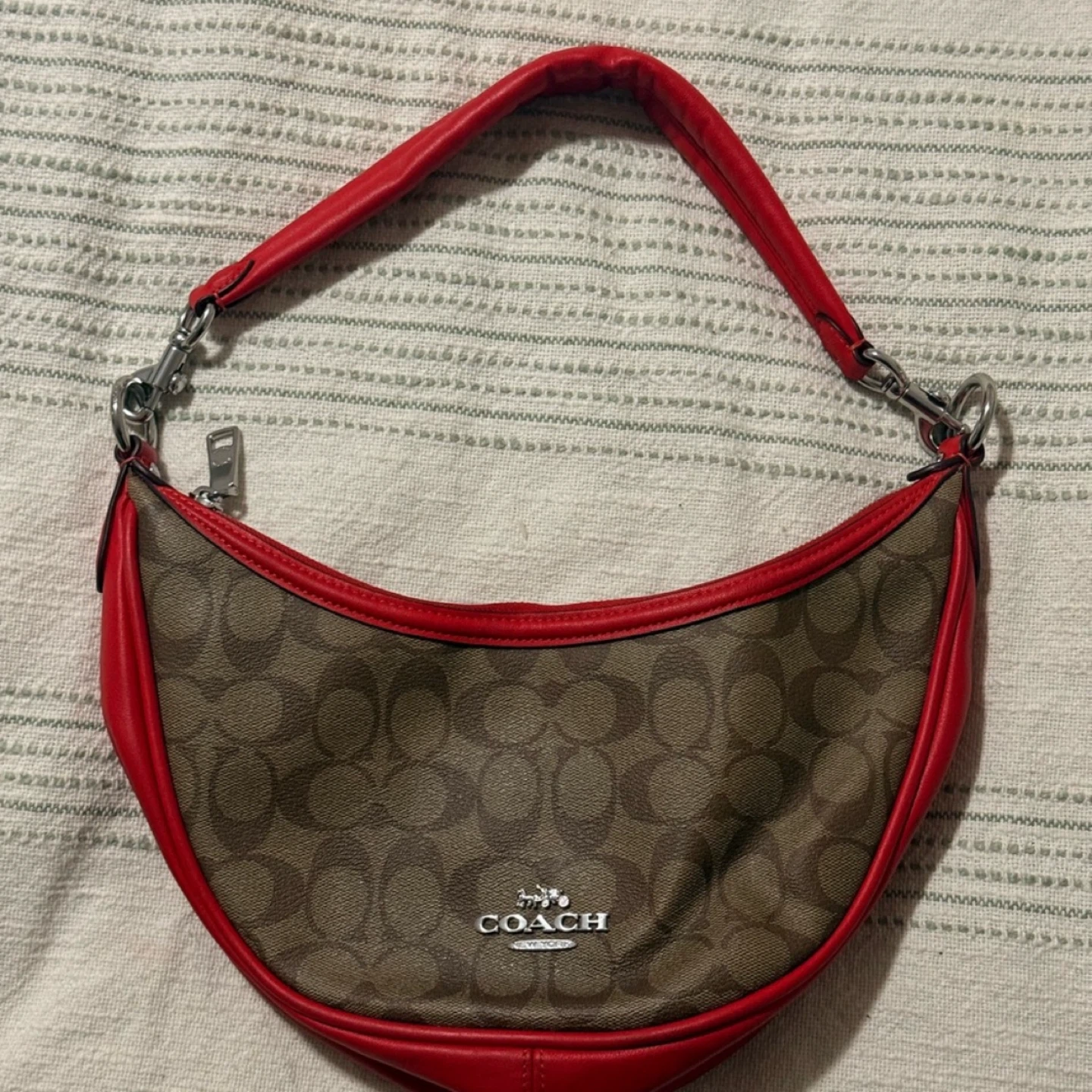 Coach half moon in Signature Canvas