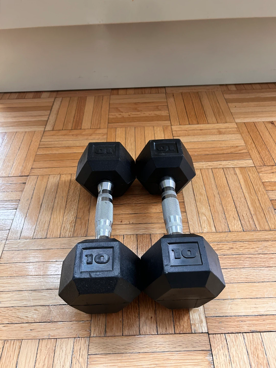 Rubber-coated hex dumbbells - pair of 10 lb weights.