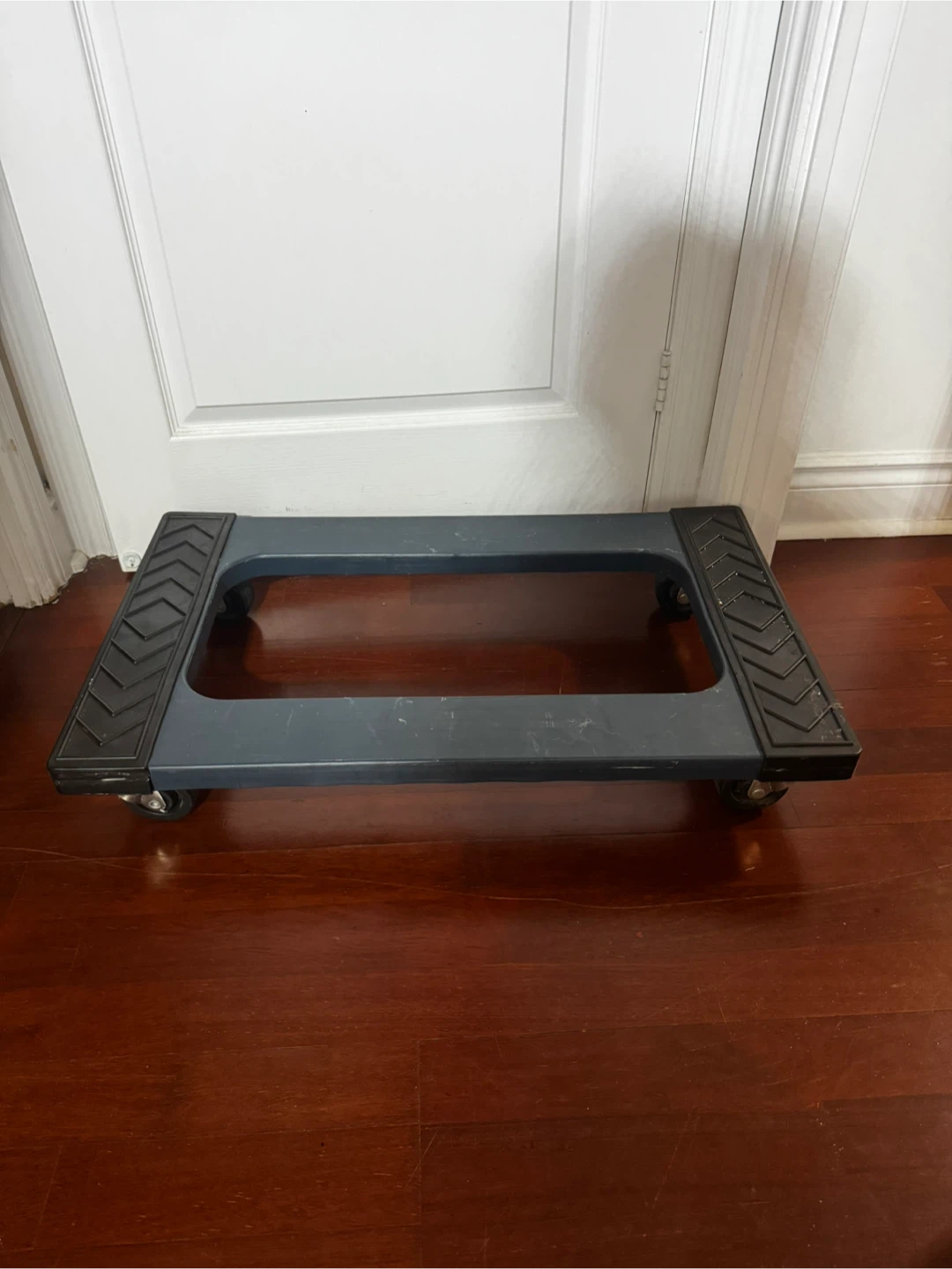 Stalwart heavy-duty plastic mover's dolly.
