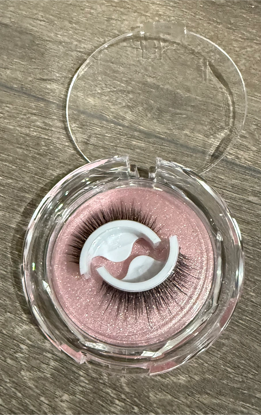 No glue needed, it sticks on easily. False Eyelashes