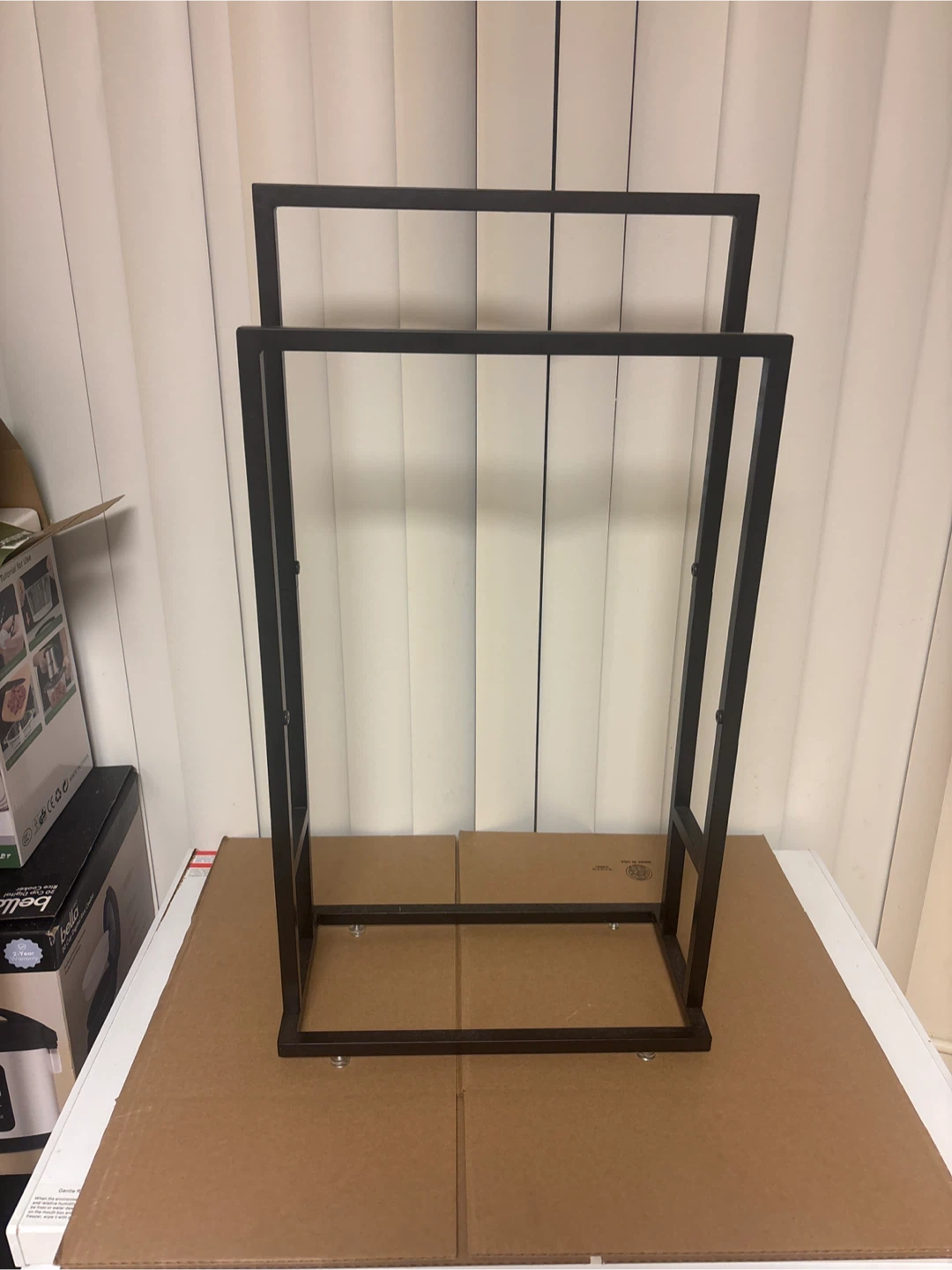 Black two tier towel rack
