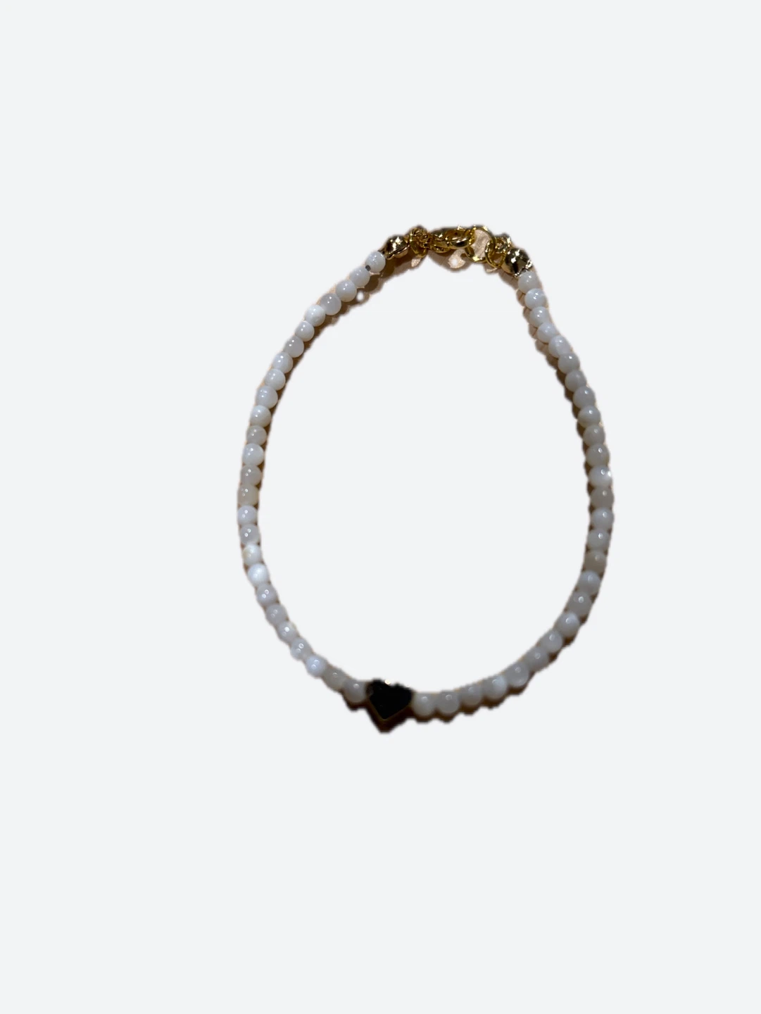 White beaded bracelet with gold heart - photo 2