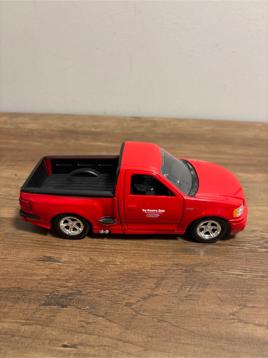 Red Ford F-150 SVT Lightning Diecast Model - photo 4