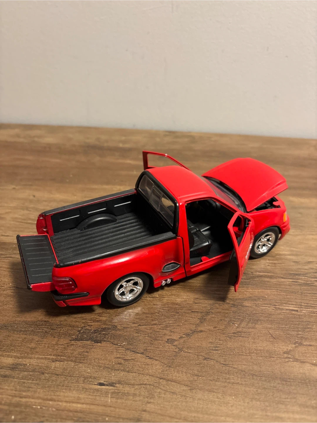 Red Ford F-150 SVT Lightning Diecast Model - photo 5