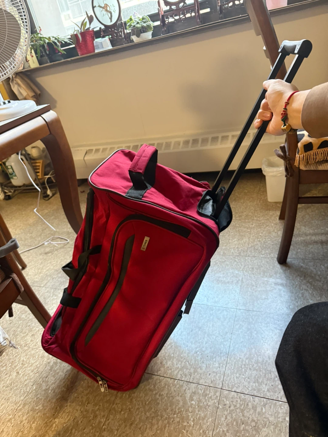TAG Red Rolling Suitcase