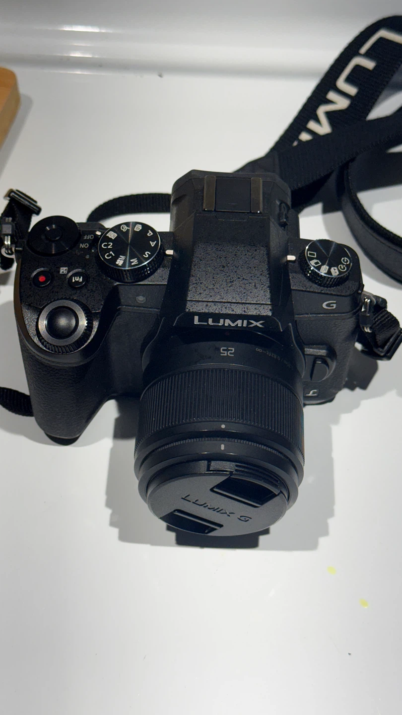 Panasonic Lumix G85 with 25 mm lens mirrorless camera