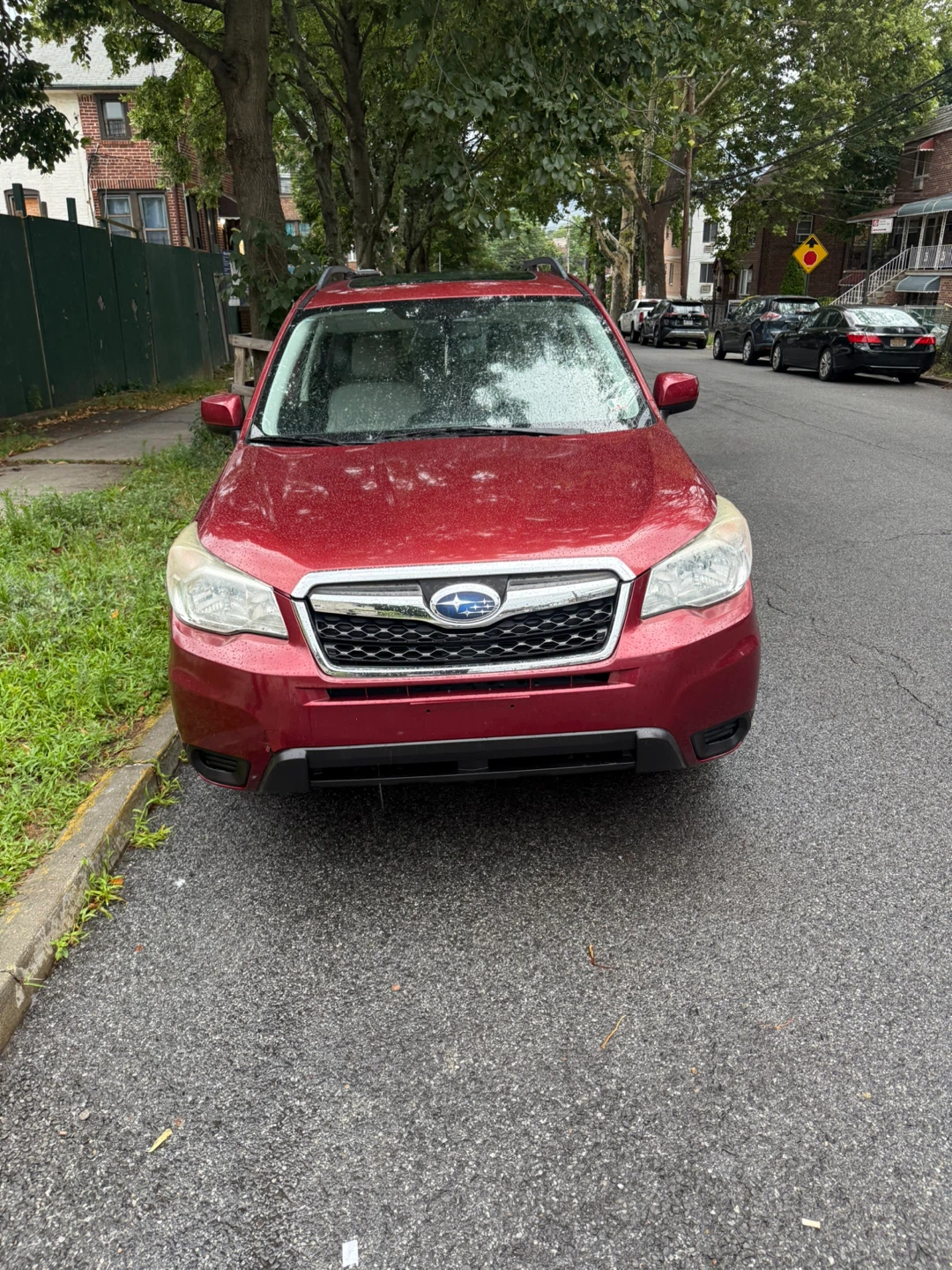 Red Subaru Forester 2015