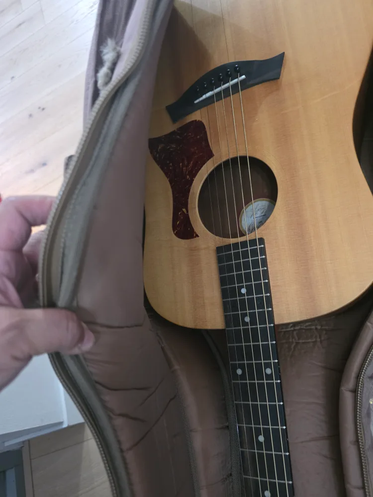 Taylor Acoustic Guitar with Gig Bag image indicator(3)