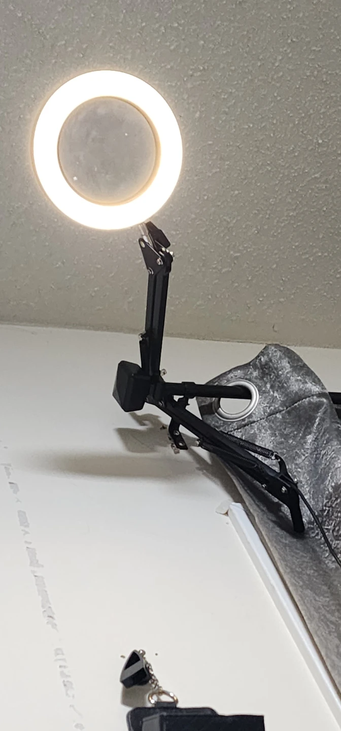 LED Ring Light with Adjustable Stand and Mirror Lens.