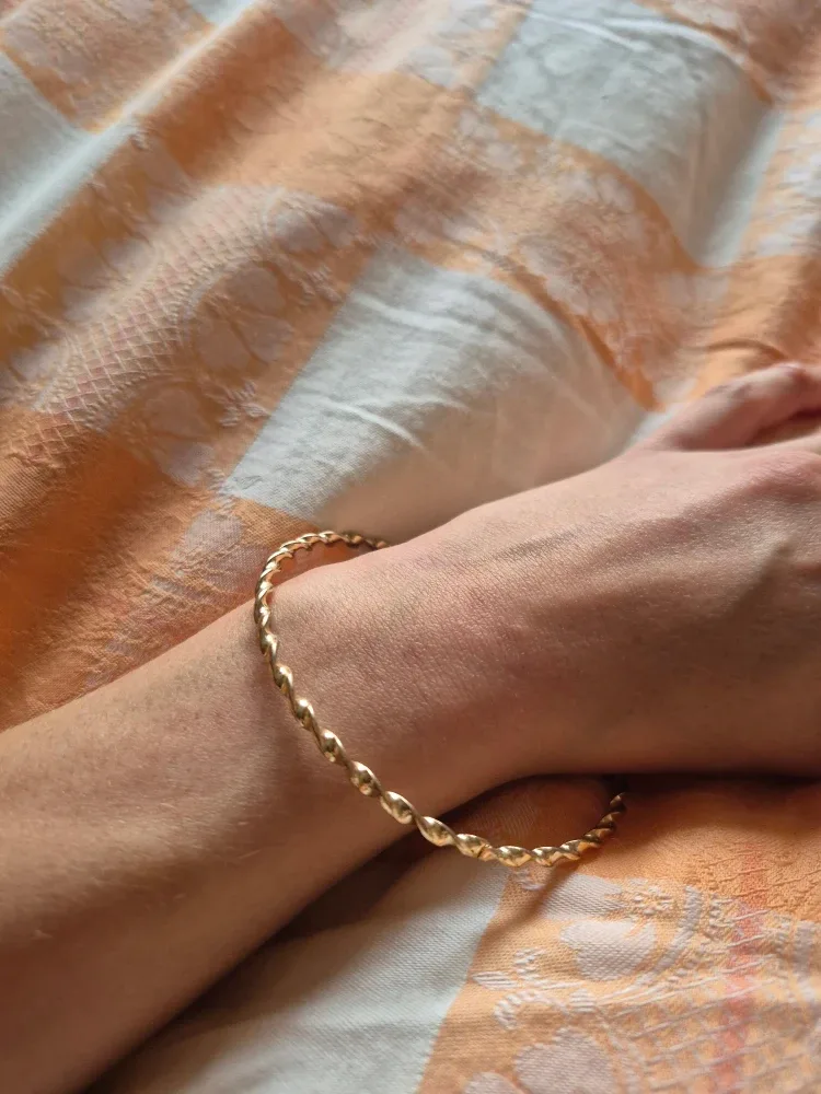 Gold Tone Twisted Bangle Bracelet