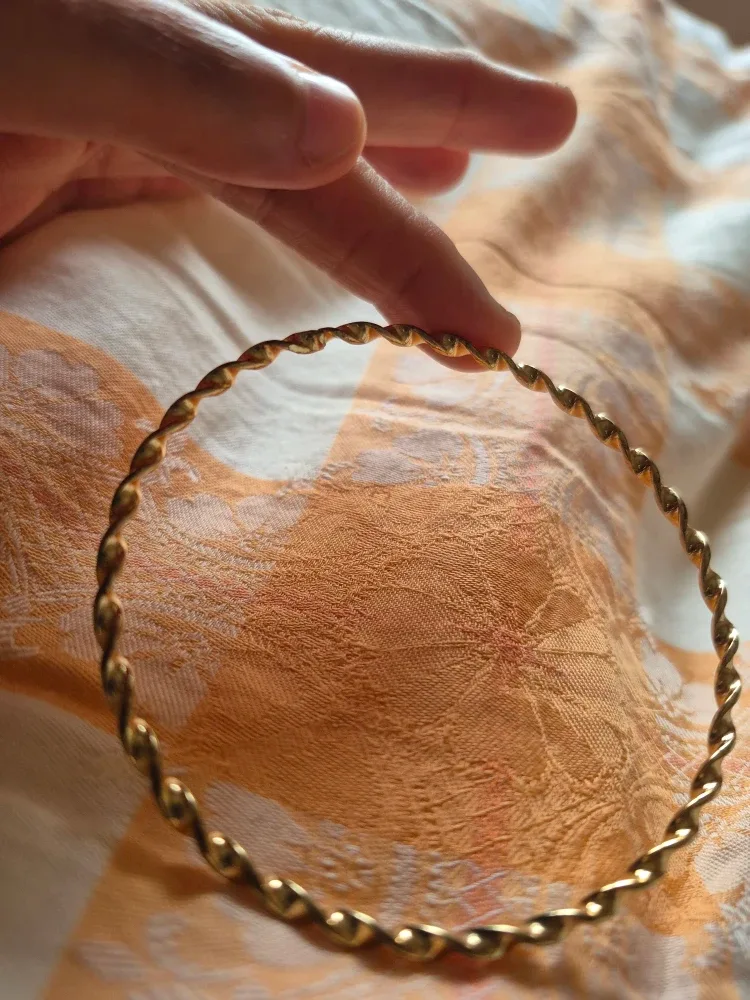 Gold Tone Twisted Bangle Bracelet image indicator(3)