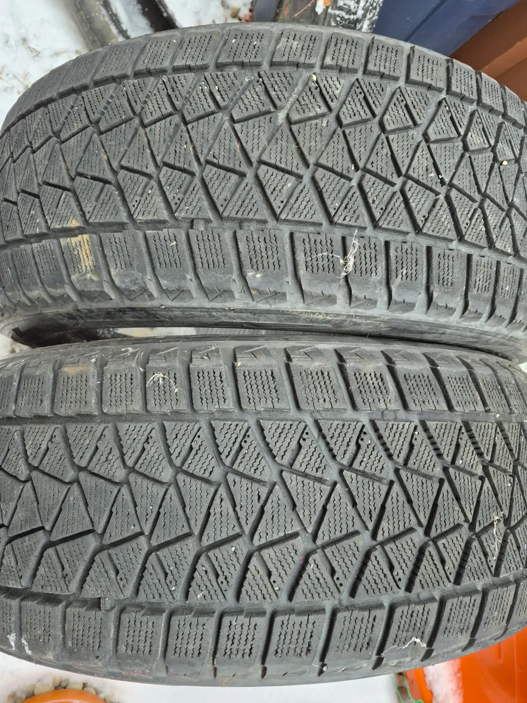235/55r20. Used Winter Tires - Set of 2 image indicator(4)