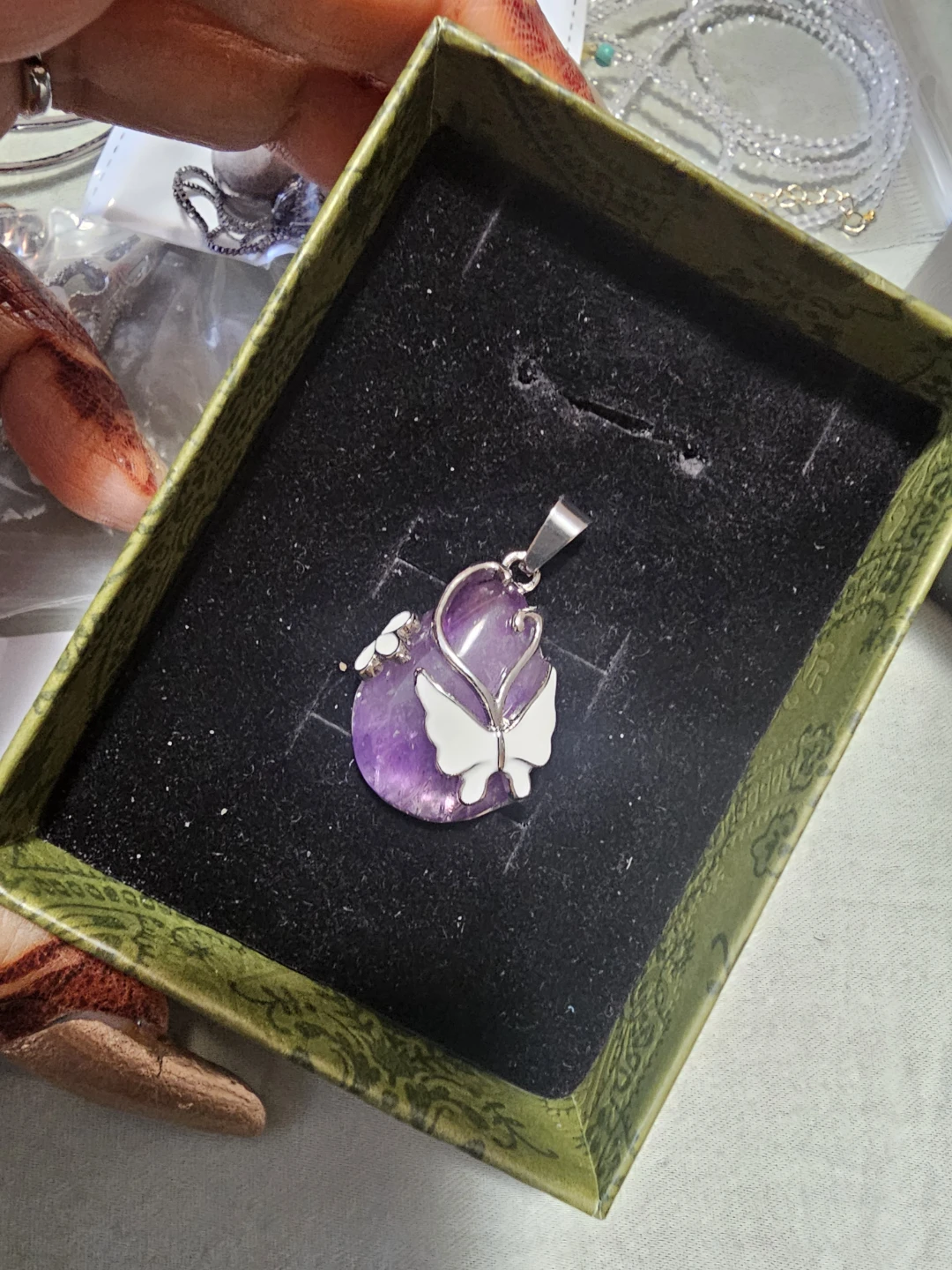 Amethyst butterfly pendant in copper setting