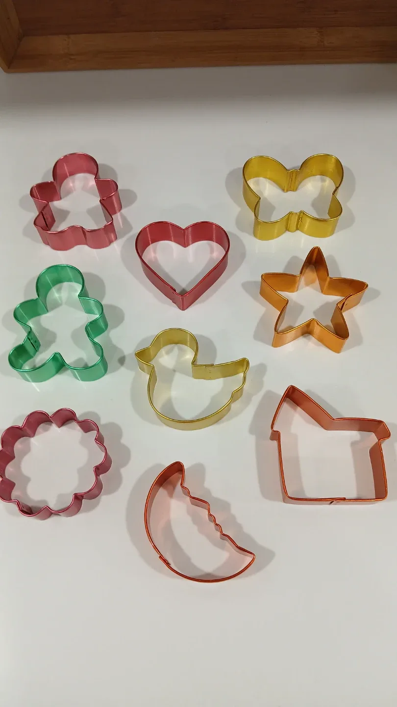 Set of colorful cookie cutters in various shapes. Never Used