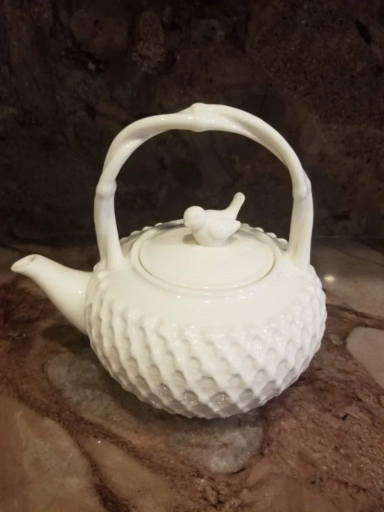 White Ceramic Teapot with Bird Detail
