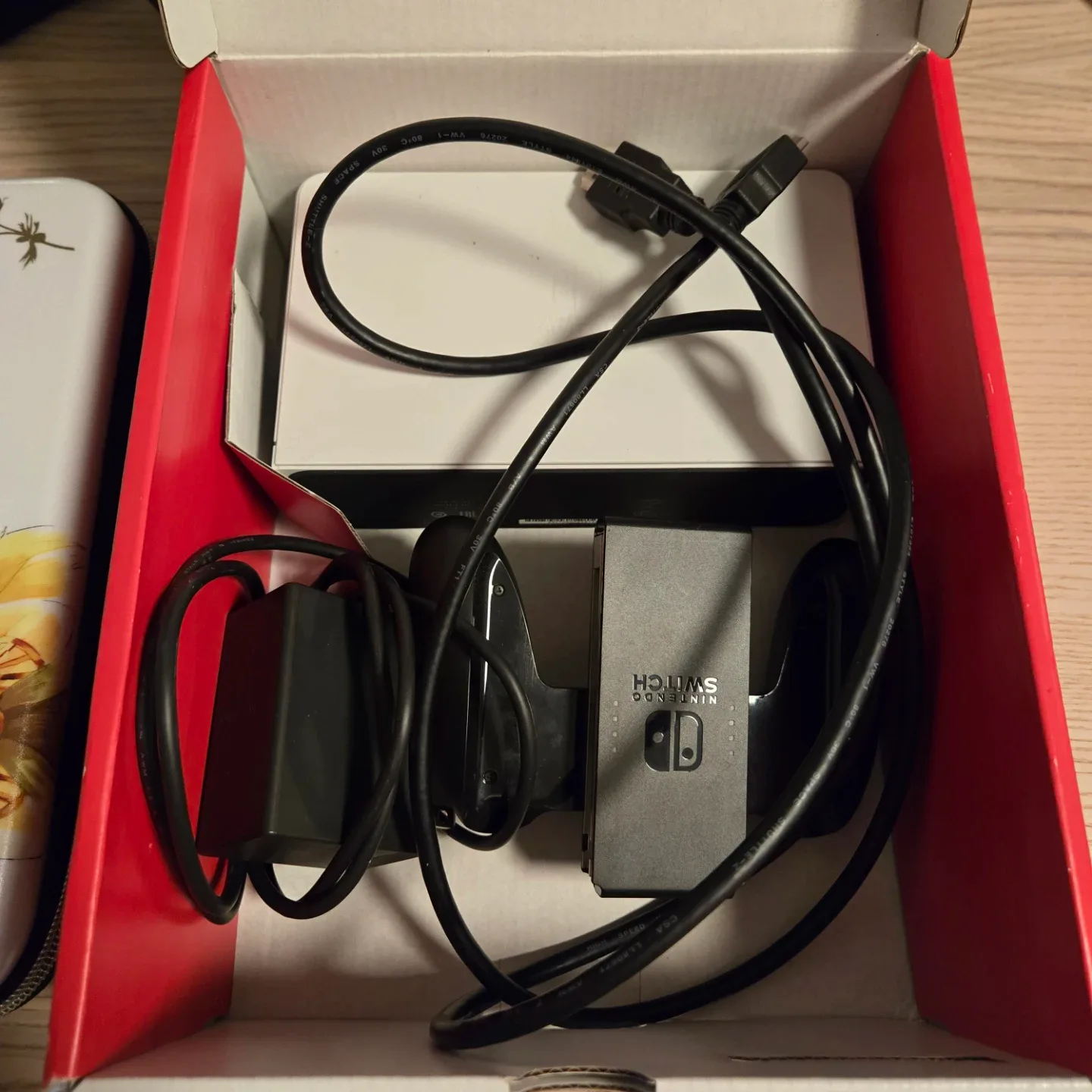 Nintendo Switch OLED like new in box. With extras image indicator(6)