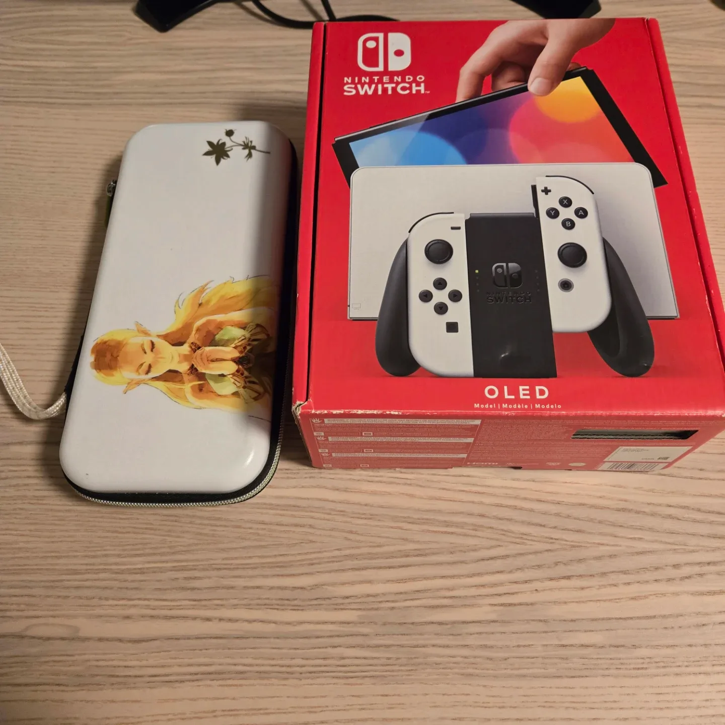 Nintendo Switch OLED like new in box. With extras image indicator(8)