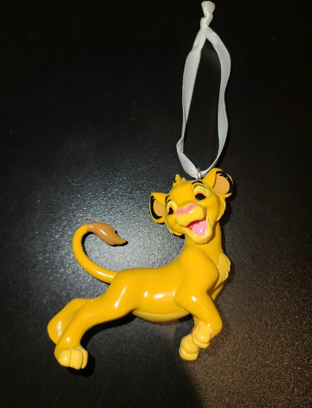 Used hallmark simba ornament