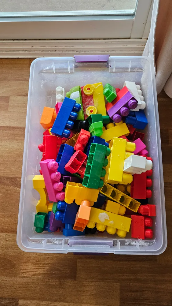 Box of colourful building blocks