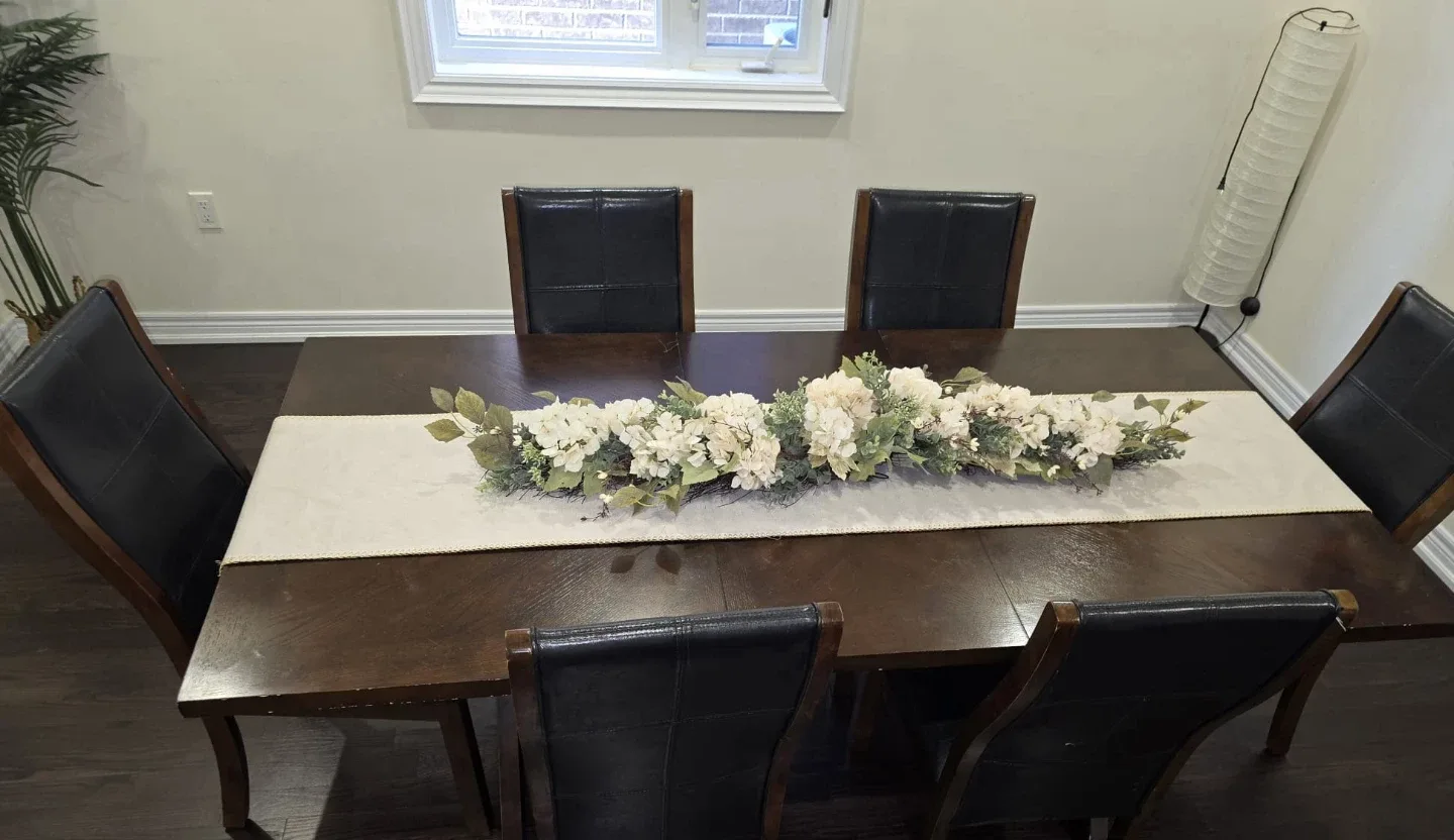 Solid wood dinning table with 6 leather chairs