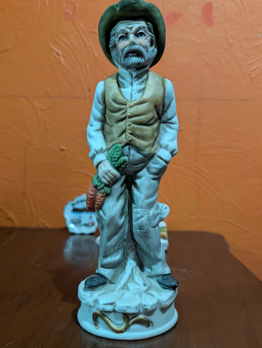 Vintage Ceramic Figurine of a Farmer