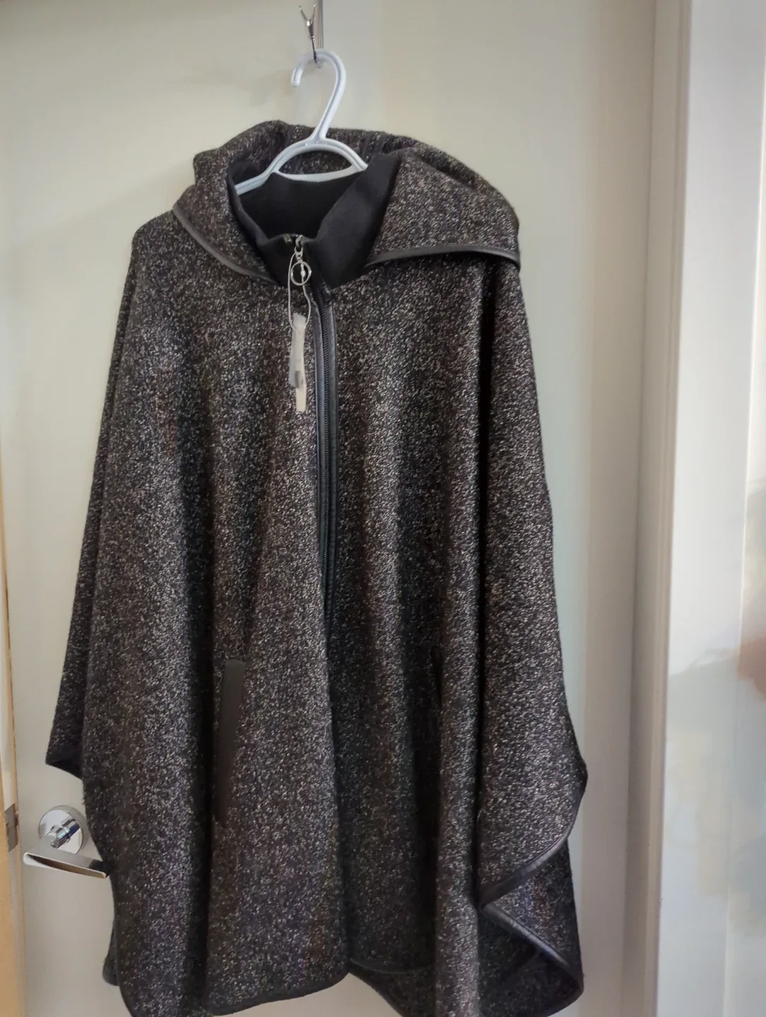 Poncho with hood poly/viscose/wool mix.