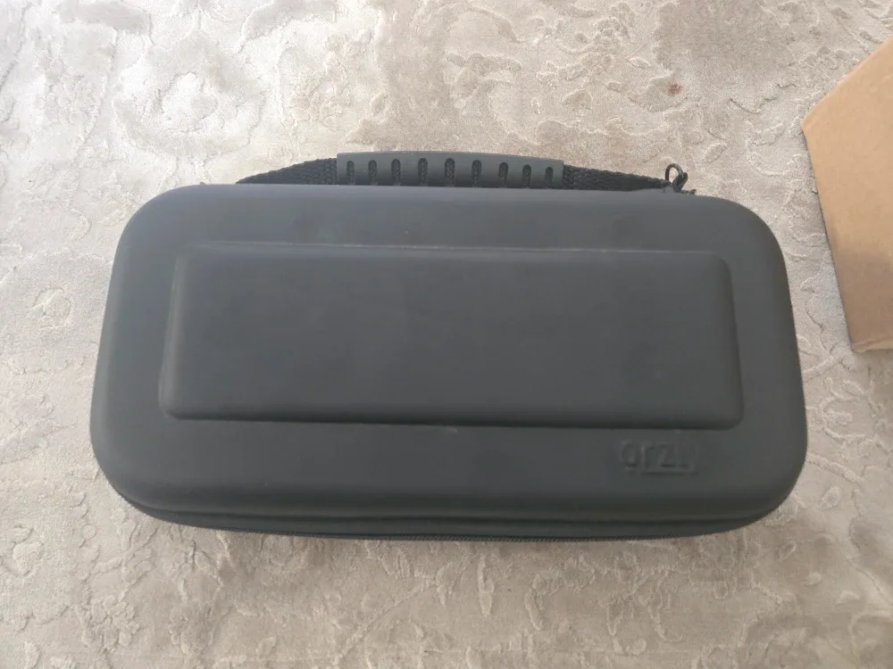 Nintendo Switch Lite Turquoise with Case & Charger image indicator(2)