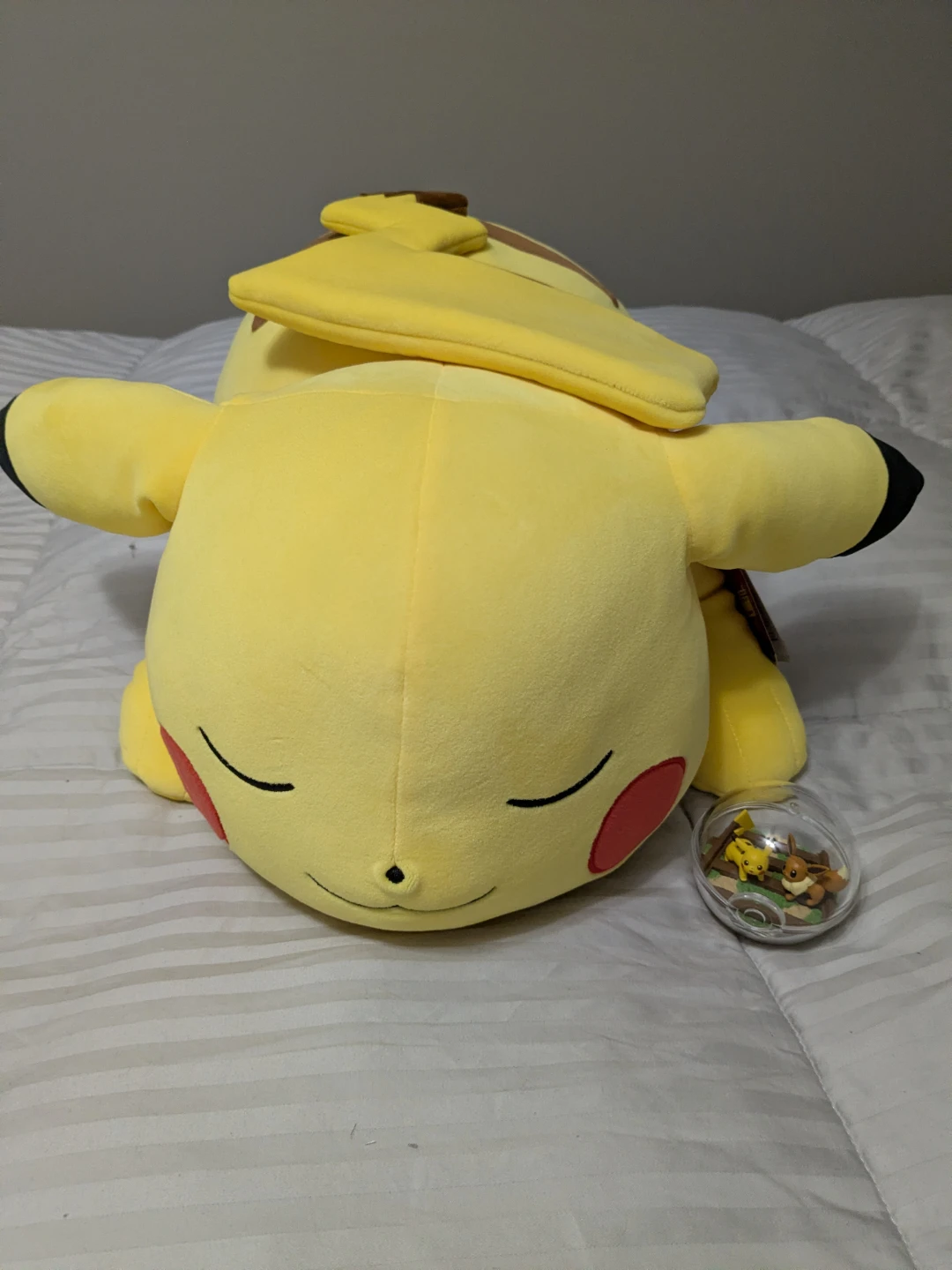 Pikachu Sleeping Plush and figure
