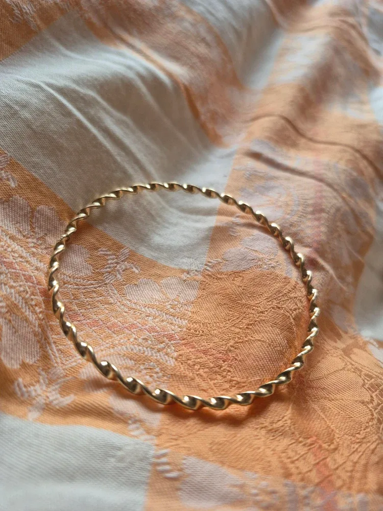 Gold Tone Twisted Bangle Bracelet image indicator(2)