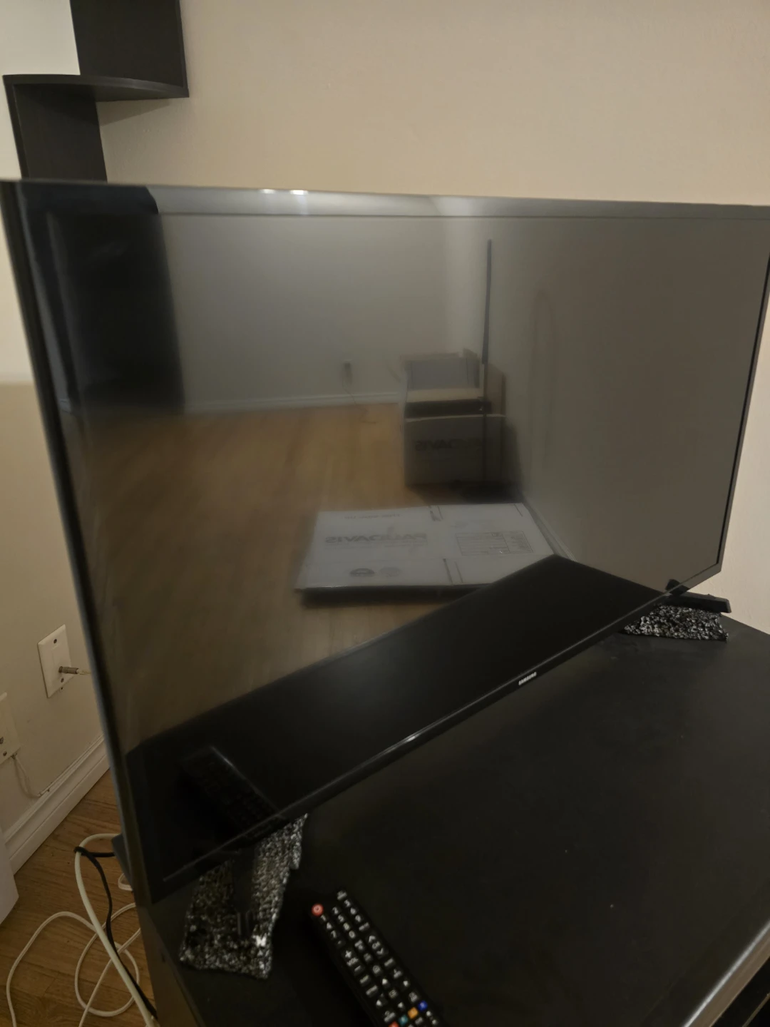 Samsung TV and Black TV Stand - photo 2