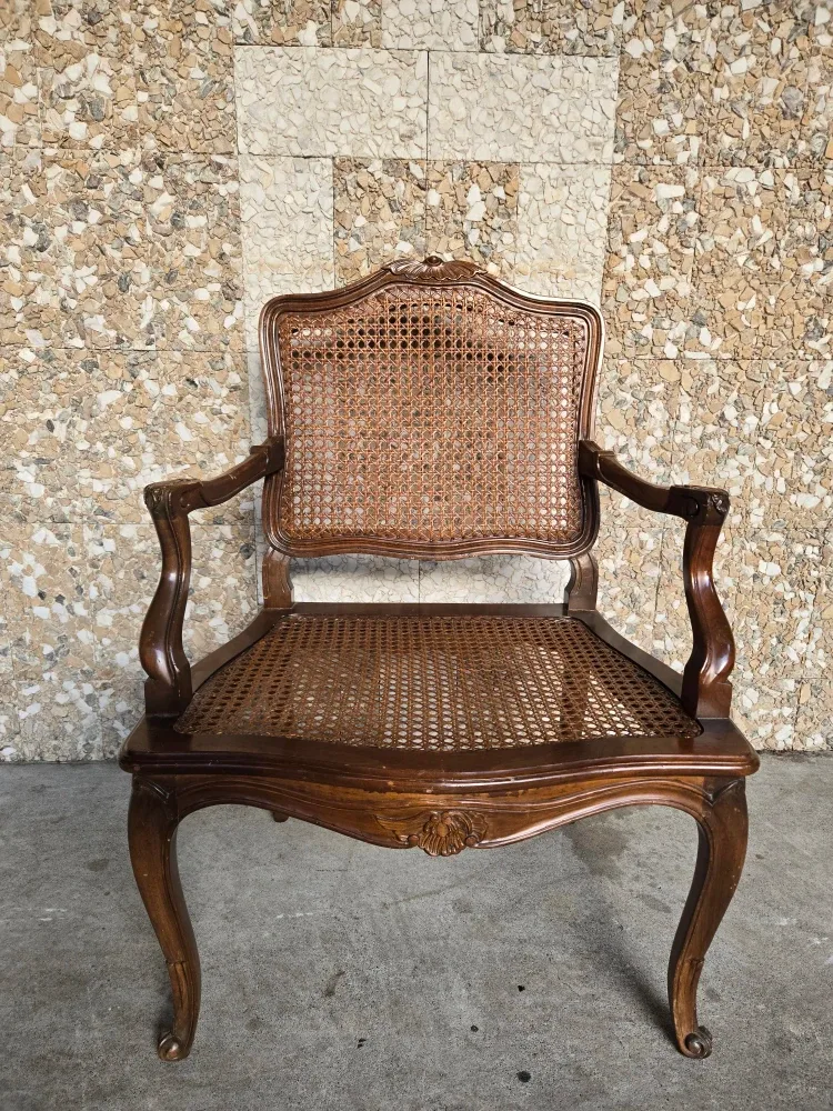 Antique Cane Rattan Accent Chair With Hand Carved Frame