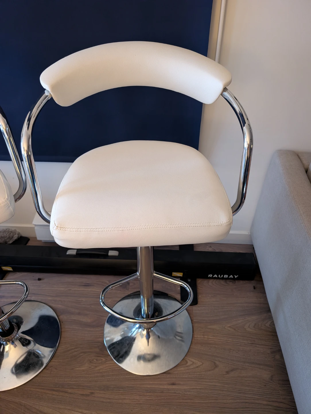 Two white barstools