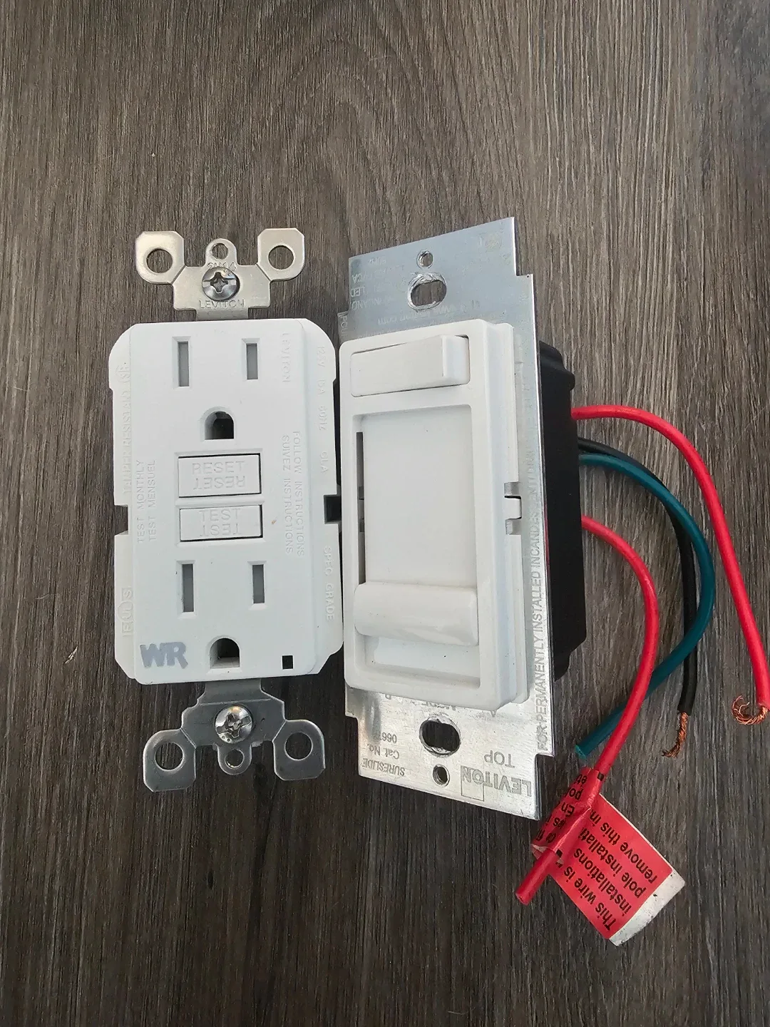Leviton Electrical Outlet and Dimmer Switch
